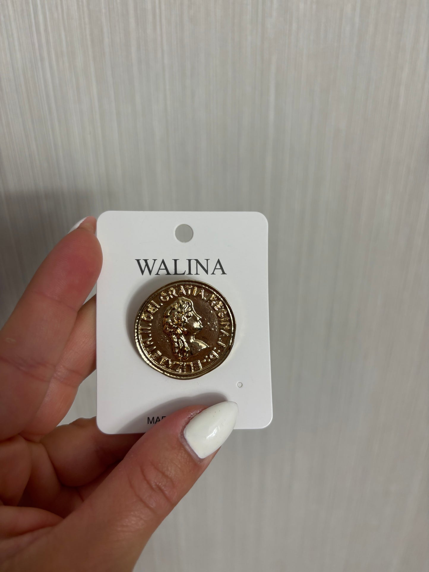 Broche moneda
