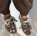 Zapatillas estampado vaca